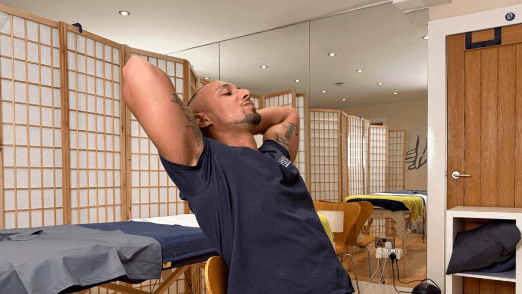 The Chair Stretch is demonstrated by Matanda. It's really simple and great for someone looking to fix their posture and help with neck or shoulder pain
