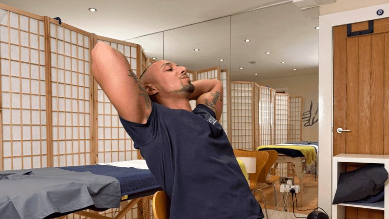 The Chair Stretch is demonstrated by Matanda. It's really simple and great for someone looking to fix their posture and help with neck or shoulder pain