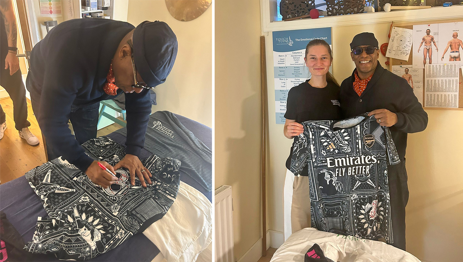 Ian Wright signing memorabilia at the Touch Tuina clinic, alongside practitioner Angelika