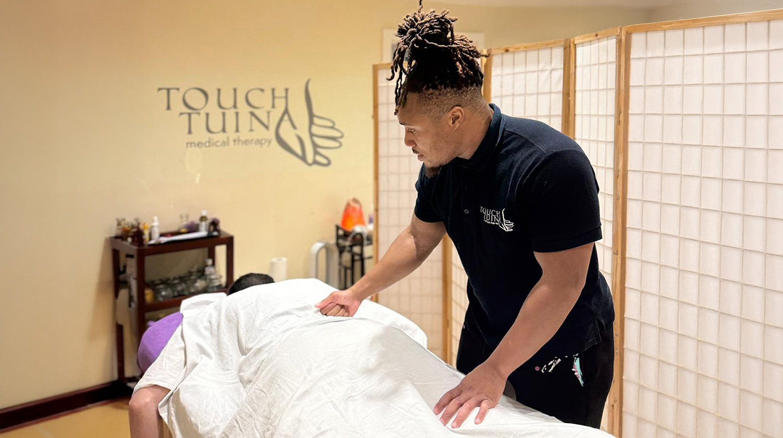 Tyler performing a Tuina Massage at the Kentish Town clinic